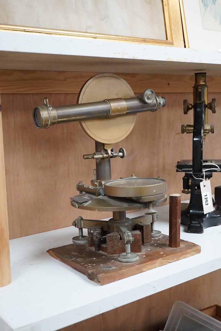 A late 19th century German brass theodolite by Hildebrand, Freiberg, serial number engraved to the centre of the compass, no. 53438, 32cm high
